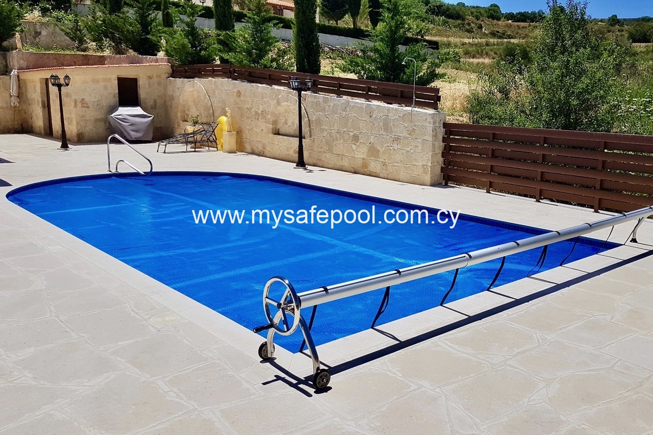 Solar Covers and Rollers - Cyprus swimming pool safety fences, safety nets,  and pool covers